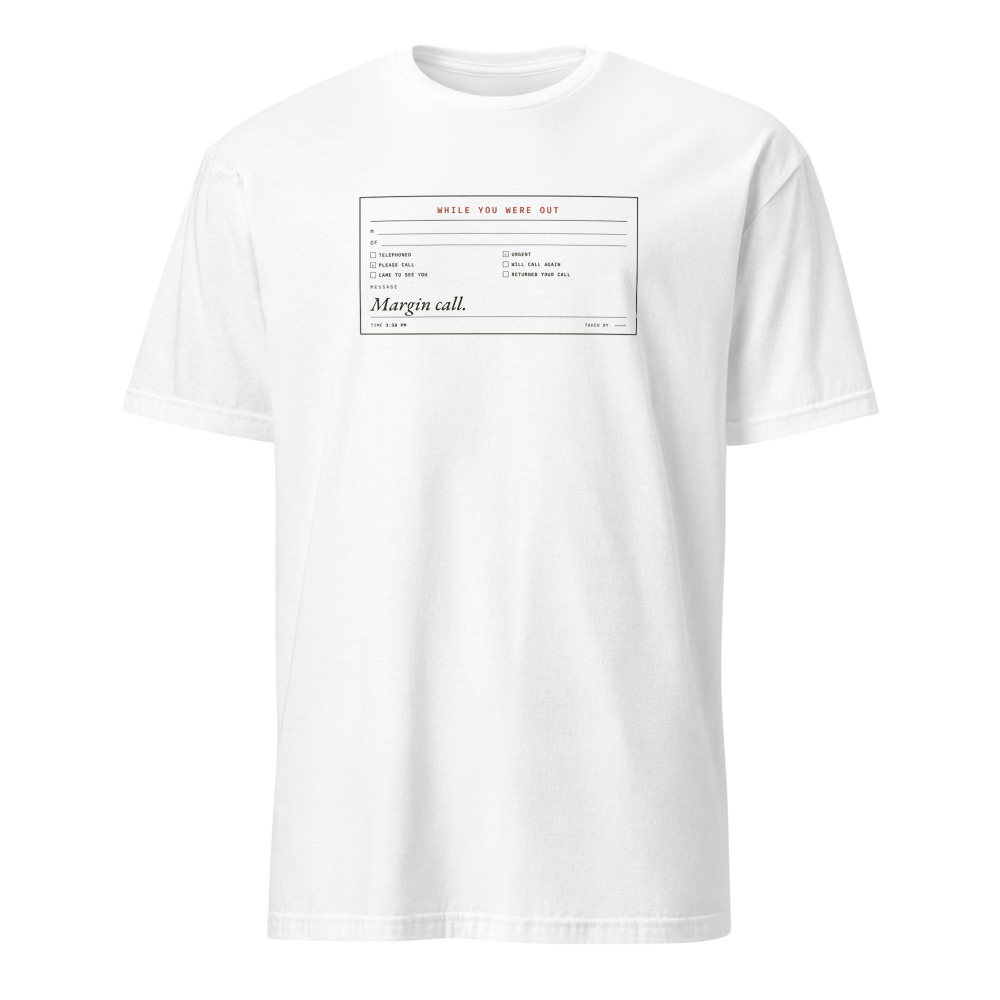 White t-shirt printed with a While You Were Out telephone message slip, urgent ticked in red, the message reading Margin call.